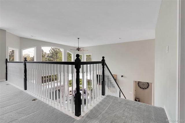 7472 S Utica St, Littleton, CO 80128 - stairway featuring a ceiling fan and baseboards