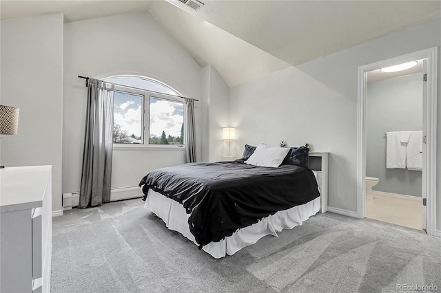 7472 S Utica St, Littleton, CO 80128 - bedroom featuring light colored carpet, vaulted ceiling, ensuite bath, a baseboard heating unit, and baseboards