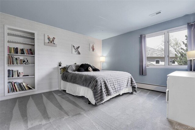 7472 S Utica St, Littleton, CO 80128 - carpeted bedroom featuring baseboard heating