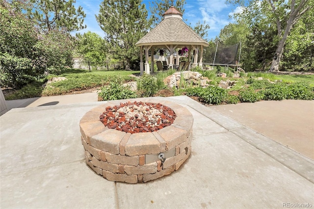 7472 S Utica St, Littleton, CO 80128 - view of patio / terrace featuring a gazebo and a trampoline