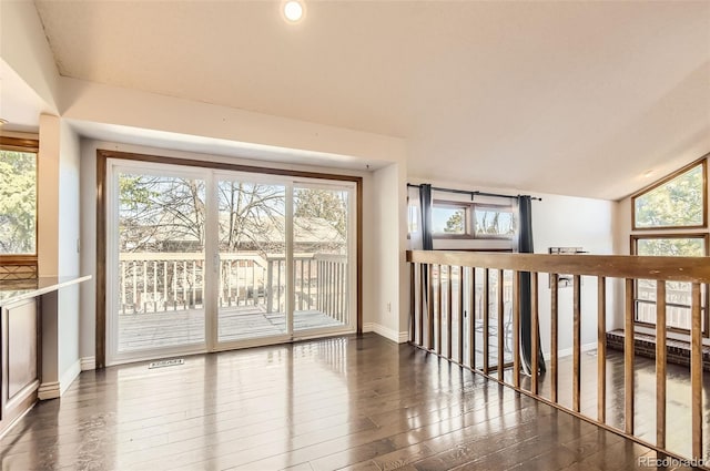 8159 Lodgepole Trl, Lone Tree, CO 80124 - empty room with hardwood / wood-style floors, baseboards, and healthy amount of natural light