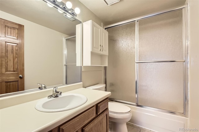 8159 Lodgepole Trl, Lone Tree, CO 80124 - bathroom with toilet, vanity, and enclosed tub / shower combo