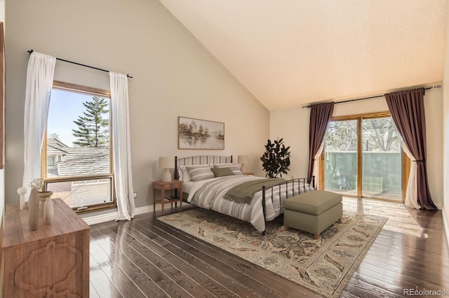 8159 Lodgepole Trl, Lone Tree, CO 80124 - bedroom with access to outside, high vaulted ceiling, dark wood-type flooring, and baseboards