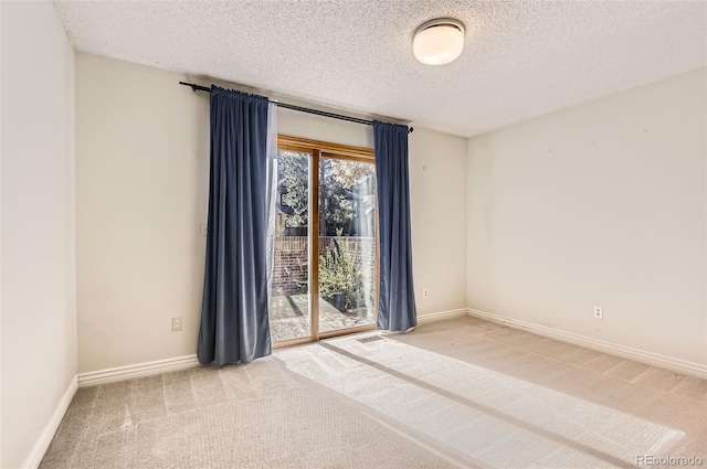 8159 Lodgepole Trl, Lone Tree, CO 80124 - carpeted spare room with a textured ceiling and baseboards