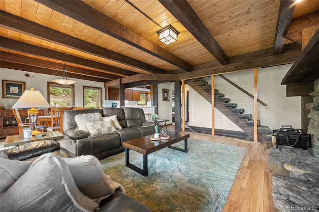 32462 Lodgepole Dr, Evergreen, CO 80439 - living area with stairs, hardwood / wood-style flooring, and a wood ceiling with exposed beams