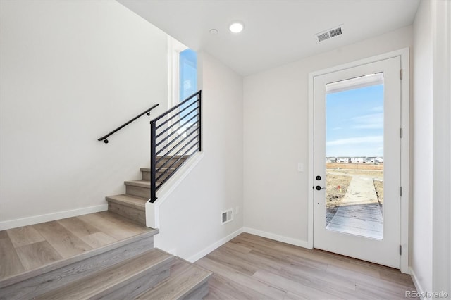 foyer entrance featuring light hardwood / wood-style flooring