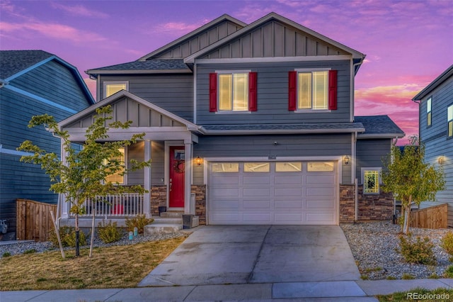 craftsman house with a garage and a porch