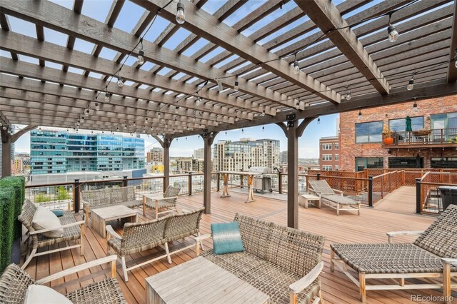 1801 Wynkoop St Unit 208, Denver, CO 80202 - wooden deck with a city view and a pergola