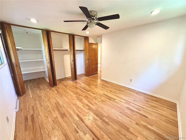 6040 W Elmhurst Dr, Littleton, CO 80128 - unfurnished bedroom featuring light wood finished floors, recessed lighting, ceiling fan, and a closet