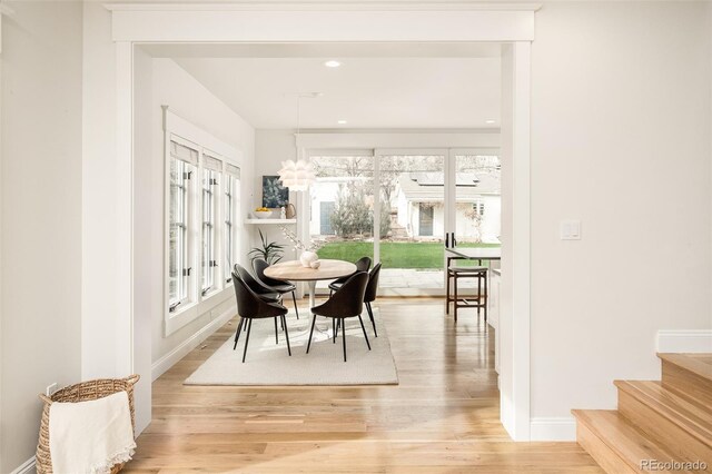 dining space featuring light hardwood / wood-style floors