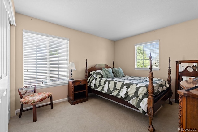 16896 E Maplewood Dr, Aurora, CO 80016 - bedroom featuring light carpet and baseboards