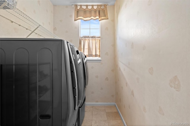 16896 E Maplewood Dr, Aurora, CO 80016 - washroom featuring independent washer and dryer, wallpapered walls, and light tile patterned floors