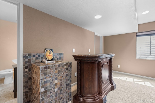 16896 E Maplewood Dr, Aurora, CO 80016 - indoor dry bar with recessed lighting and light carpet