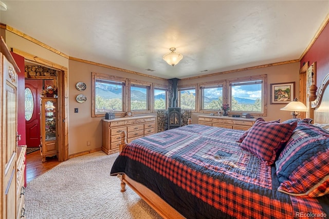 12850 County Road 261k, Nathrop, CO 81236 - bedroom with light colored carpet and crown molding