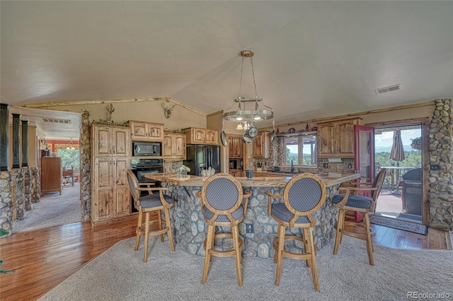 12850 County Road 261k, Nathrop, CO 81236 - dining area with light wood-style floors and vaulted ceiling