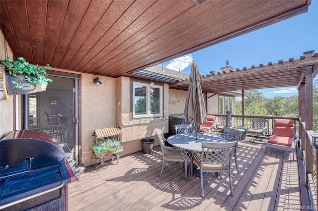 12850 County Road 261k, Nathrop, CO 81236 - wooden deck with outdoor dining area and a grill