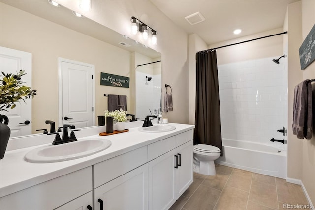 full bathroom featuring toilet, tile patterned flooring, shower / bath combination with curtain, and vanity