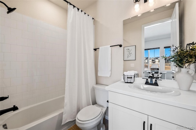 full bathroom with toilet, vanity, and shower / bath combo with shower curtain