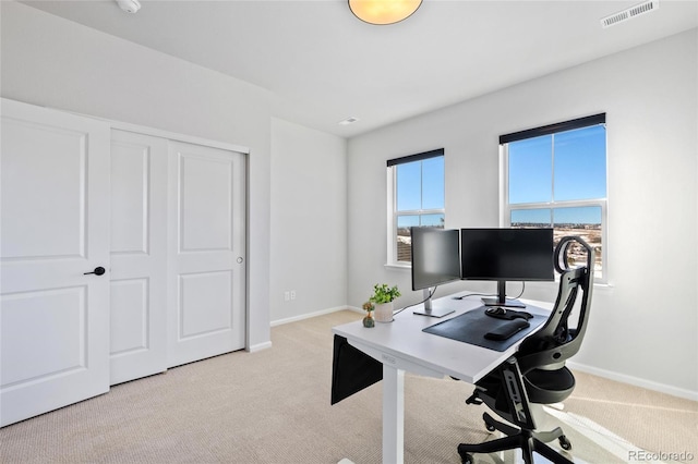 view of carpeted office space