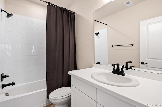 full bathroom featuring toilet, vanity, and shower / bathtub combination with curtain