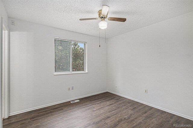 2832 S Mobile St, Aurora, CO 80013 - unfurnished room with wood finished floors, a textured ceiling, and a ceiling fan