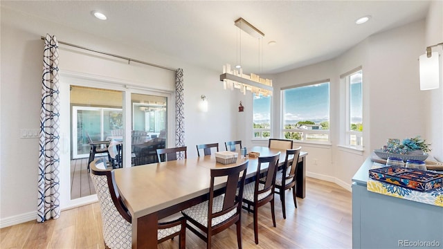 1246 Highland Pl, Erie, CO 80516 - dining room with light wood-type flooring and recessed lighting