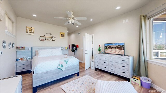 1246 Highland Pl, Erie, CO 80516 - bedroom with light wood finished floors, recessed lighting, and ceiling fan