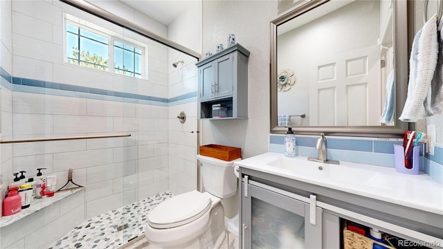 1246 Highland Pl, Erie, CO 80516 - bathroom featuring tiled shower and vanity