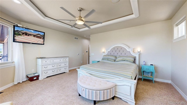 1246 Highland Pl, Erie, CO 80516 - carpeted bedroom with a raised ceiling and ceiling fan
