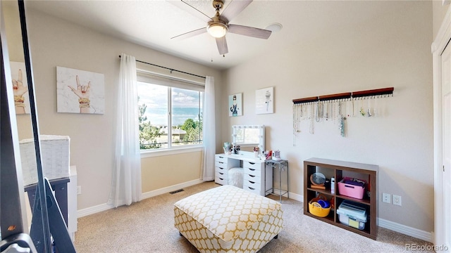 1246 Highland Pl, Erie, CO 80516 - living area featuring light colored carpet and ceiling fan