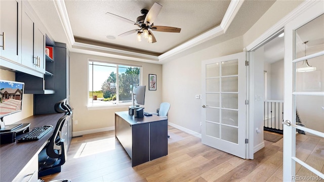 1246 Highland Pl, Erie, CO 80516 - office space with light wood finished floors, a raised ceiling, a ceiling fan, and ornamental molding
