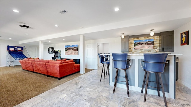 1246 Highland Pl, Erie, CO 80516 - kitchen with a breakfast bar and recessed lighting