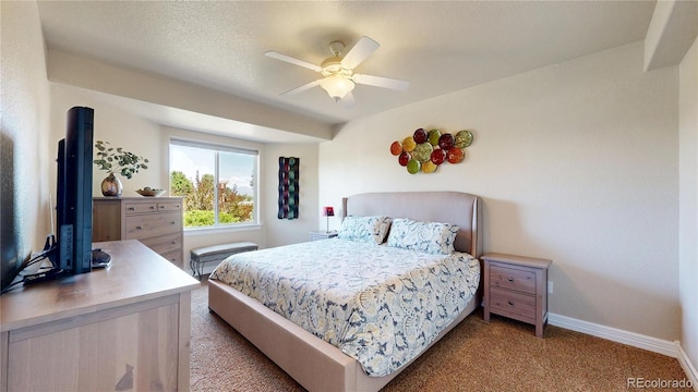 1246 Highland Pl, Erie, CO 80516 - carpeted bedroom with baseboards and ceiling fan