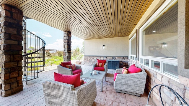 1246 Highland Pl, Erie, CO 80516 - view of patio featuring an outdoor hangout area and stairs