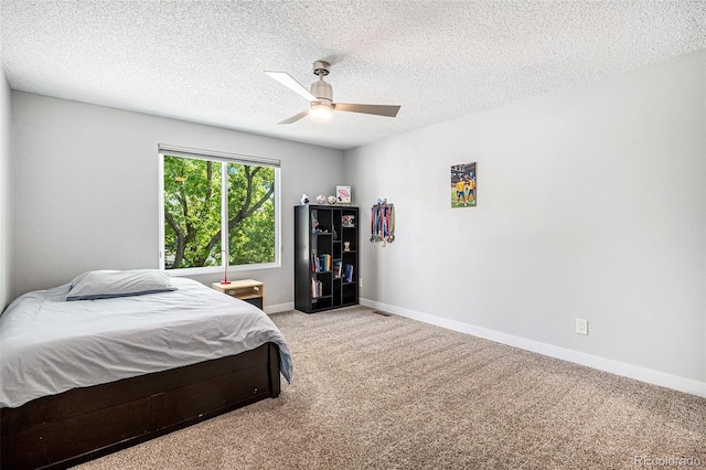 9673 Pinebrook St, Highlands Ranch, CO 80130 - carpeted bedroom featuring baseboards, ceiling fan, and a textured ceiling