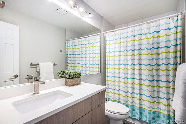 9673 Pinebrook St, Highlands Ranch, CO 80130 - bathroom featuring toilet, vanity, and curtained shower
