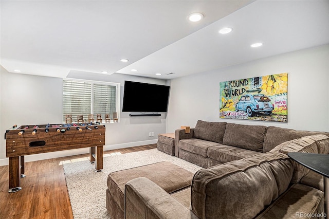 9673 Pinebrook St, Highlands Ranch, CO 80130 - living area featuring wood finished floors, baseboards, and recessed lighting