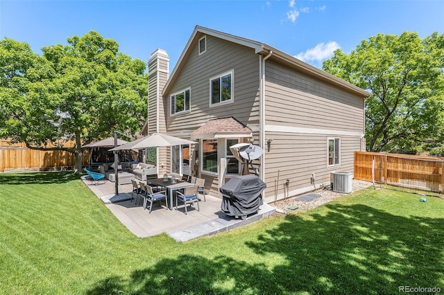 9673 Pinebrook St, Highlands Ranch, CO 80130 - back of house featuring outdoor lounge area, a patio, and central AC unit