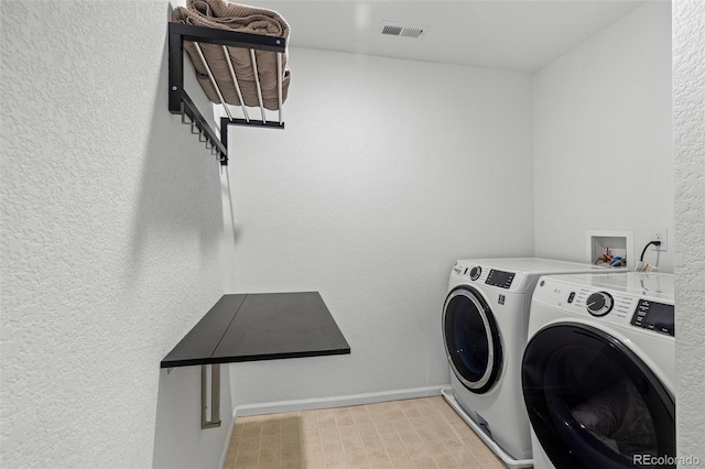 1228 Argali Dr, Severance, CO 80550 - laundry area featuring independent washer and dryer and baseboards