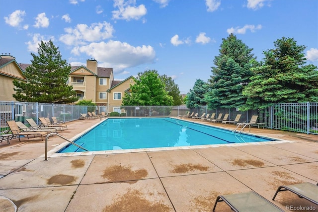 9692 W Coco Cir Unit 103, Littleton, CO 80128 - community pool featuring a patio