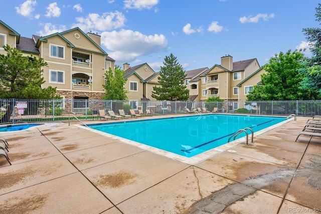 9692 W Coco Cir Unit 103, Littleton, CO 80128 - community pool with a residential view and a patio