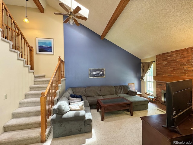 971 S Evanston Cir, Aurora, CO 80012 - living area with beam ceiling, stairway, a textured ceiling, ceiling fan, and high vaulted ceiling