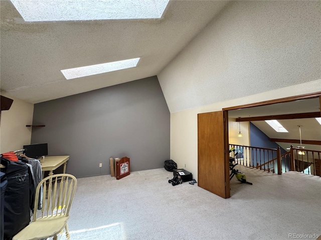 971 S Evanston Cir, Aurora, CO 80012 - additional living space featuring a skylight, vaulted ceiling, carpet floors, and a textured ceiling