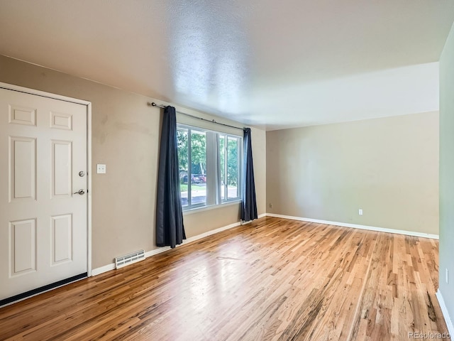 1455 S Zephyr St, Lakewood, CO 80232 - entrance foyer featuring wood finished floors