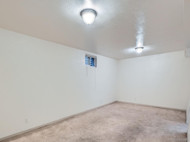1455 S Zephyr St, Lakewood, CO 80232 - empty room featuring light carpet and baseboards