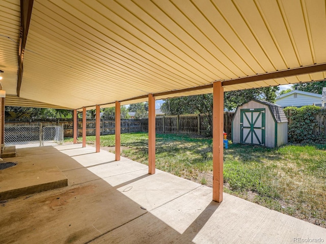 1455 S Zephyr St, Lakewood, CO 80232 - fenced backyard featuring a patio and a storage shed