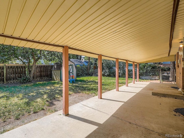 1455 S Zephyr St, Lakewood, CO 80232 - fenced backyard with a patio area and a shed