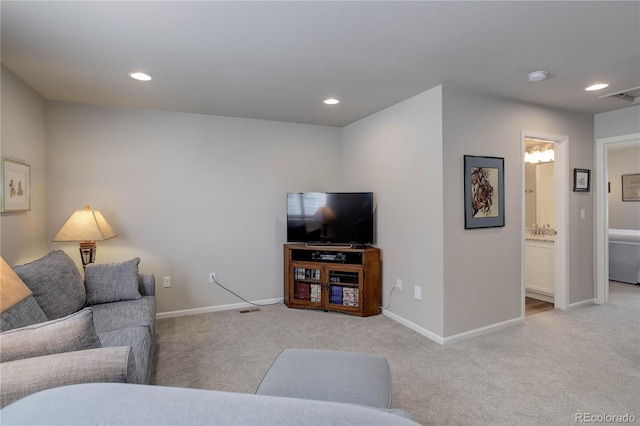 6330 Lythmore Grv, Colorado Springs, CO 80927 - living area with light colored carpet, baseboards, and recessed lighting