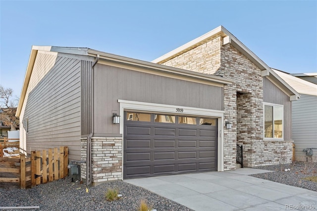 view of side of home featuring a garage