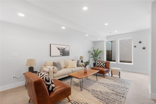 3725 N Franklin St, Denver, CO 80205 - living area featuring finished concrete floors, baseboards, and recessed lighting